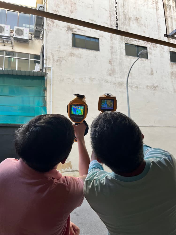 Students practicing thermal camera fieldwork